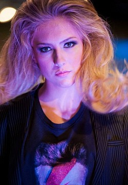 Eye Contact - My photography experience goes back decades.  This was from a Mango Store Opening Celebration Fashion Show around 2010.  I have extensive experience in working with models from the studio to my favorite, the press pit.